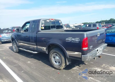 1999 Ford F150 z USA, uszkodzony, nr VIN 1FTRX18W4XNA64993